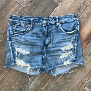 Distressed medium wash denim jeans
